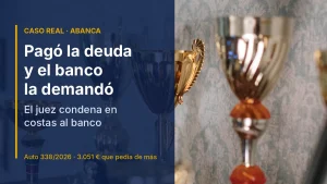Trofeos dorados con la franja «Pagó la deuda y el banco la demandó: el juez condena en costas al banco», caso real contra ABANCA